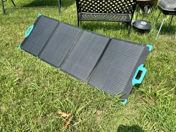 Renogy E.Flex 220W portable solar panel set up on grass
